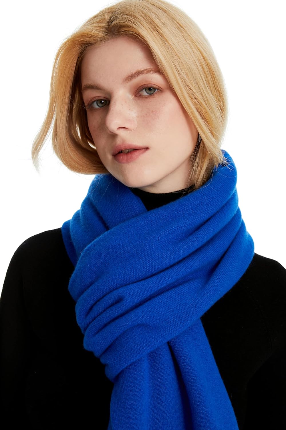 Oversized cashmere pashmina wrap in warm neutral tones with featherlight drape — back