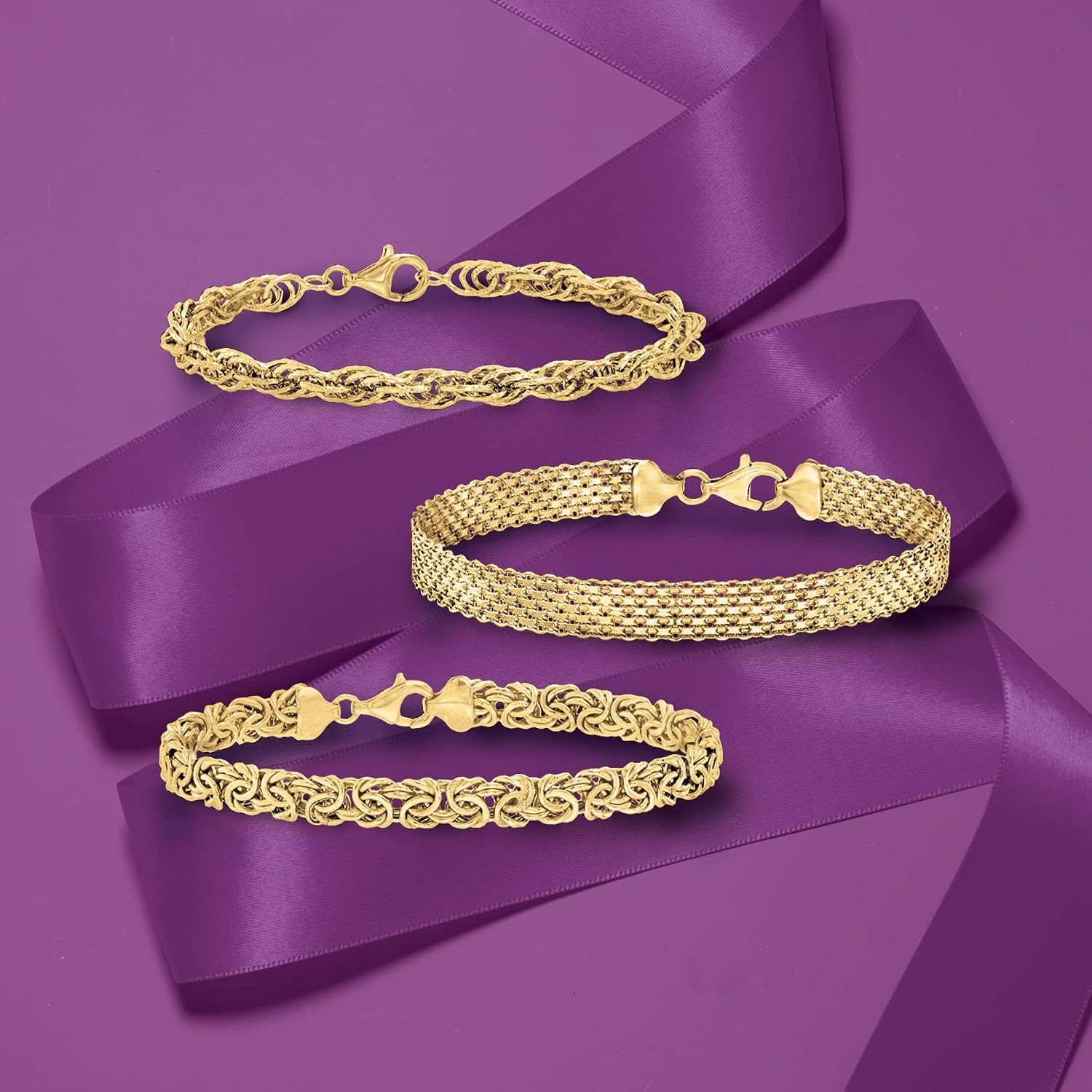 Three sterling silver link bracelets stacked together, classic polished design — view 2