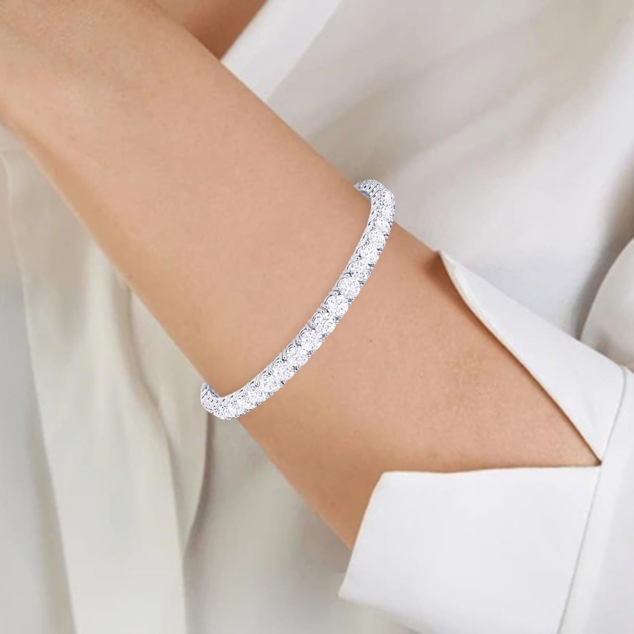 Natural diamond tennis bracelet in 14K gold with 4-prong settings — view 3