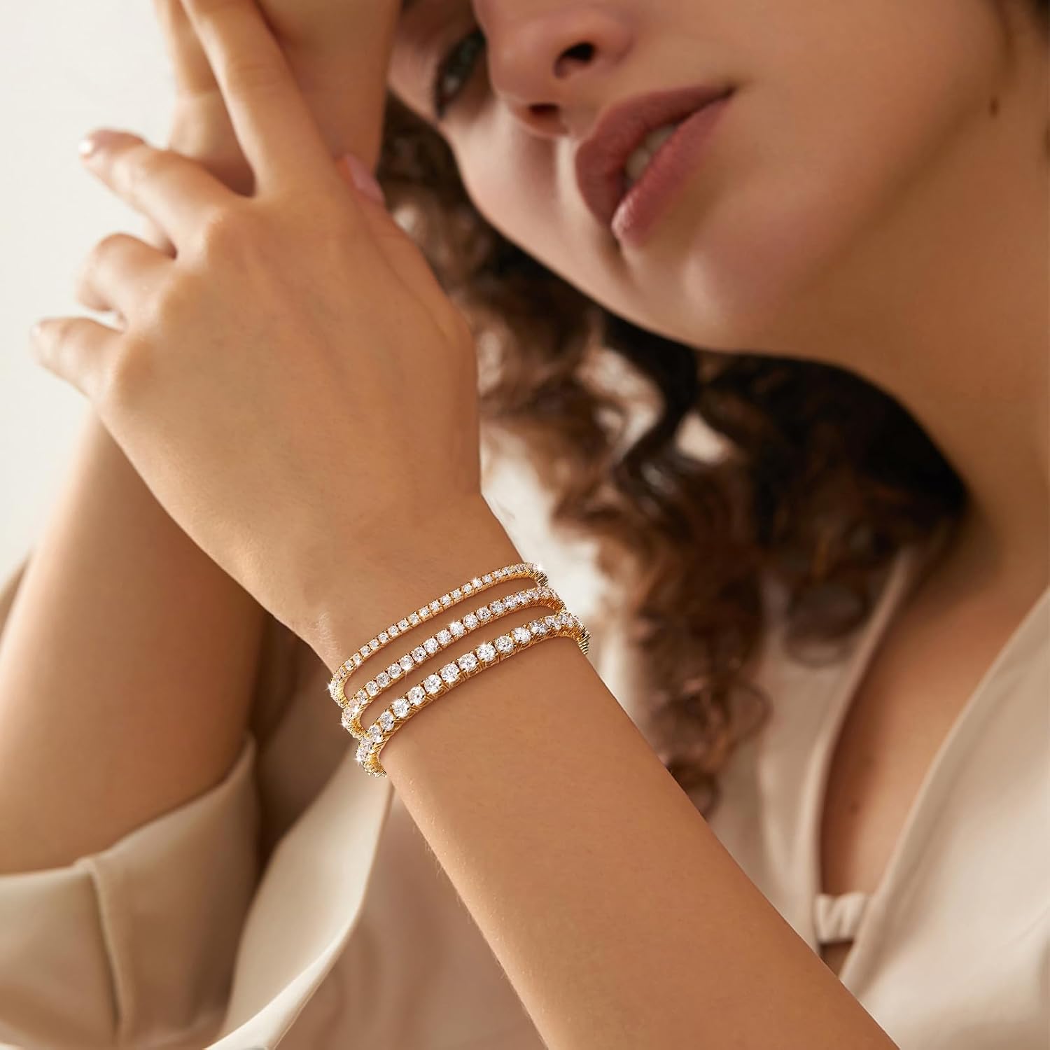 Moissanite tennis bracelet in gold-plated sterling silver — round brilliant cut stones — view 1
